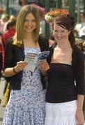 26 July 2005; Michelle Tynan, left, and Alice Fahey, both of Loughrea, Co. Galway enjoy a day at the Galway Races, Ballybrit, Co. Galway. Picture credit; Pat Murphy / SPORTSFILE
