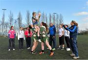 26 February 2014; Players from St MacDara's School during lineout coaching with Leinster Rugby Women's Development Officer Jennie Bognell and Leinster and Ireland player Sophie Spence at a Dublin Girls Give It a Try Blitz. Templeogue United / St. Judes GAA Grounds, Dublin. Picture credit: Matt Browne / SPORTSFILE