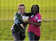 26 February 2014; Uju Ukpona, from Firhouse CS, Dublin, right, in action against Katie McGowan, from St. Dominic's, Dublin, during the Dublin Girls Give It a Try Blitz. Templeogue United / St. Judes GAA Grounds, Dublin. Picture credit: Matt Browne / SPORTSFILE