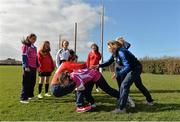 26 February 2014; Leinster Rugby Women's Development Officer Jennie Bognell instructs the players during the Dublin Girls Give It a Try Blitz. Templeogue United / St. Judes GAA Grounds, Dublin. Picture credit: Matt Browne / SPORTSFILE
