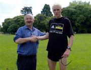 10 July 2005; Editor of the Irish Runner Frank Greally congratulates Keith Kelly, Drogheda, after his win in the adidas Irish Runner Challenge. Phoenix Park, Dublin.. Picture credit; Brian Lawless / SPORTSFILE