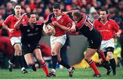 8 January 2000; Ronan O'Gara, Munster, in action against Nick Walsh, left, and theirry Lacroix, Saracens. Heineken European Cup, Munster v Saracens, Thomond Park, Limerick. Picture credit: Brendan Moran / SPORTSFILE