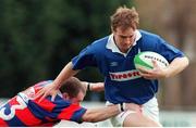 12 March 2000; Denis Hickie, St Mary's, is tackled by Darragh McElligott, Clontarf. AIB League Rugby, Division 1, St Mary's College v Clontarf, Templeville Road, Dublin. Picture credit: Matt Browne / SPORTSFILE *** Local Caption ***
