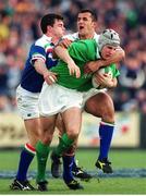 4 March 2000; Girvan Dempsey, Ireland, is tackled by Cristian Stoica, right, Italy. Six Nations Rugby International, Ireland v Italy, Lansdowne Road, Dublin. Picture credit: Matt Browne / SPORTSFILE