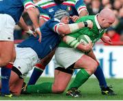 4 March 2000; John Hayes, Ireland, is tackled by Wilhelmus Visser, Italy. Six Nations Rugby International, Ireland v Italy, Lansdowne Road, Dublin. Picture credit: Matt Browne / SPORTSFILE