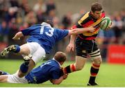 20 May 2000; Gordon D'Arcy, Lansdowne, is tackled by Denis Hickie and Ray McIlreavy, 13, St. Mary's. AIB All-Ireland League Rugby Final, St Mary's v Lansdowne, Lansdowne Road, Dublin. Picture credit: Brendan Moran / SPORTSFILE