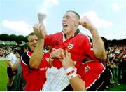 6 May 2000; Munster scrum-half Peter Stringer celebrates victory over Toulouse with team-mates John O'Neill, left, and Marcus Horan. Heineken European Cup semi-final, Toulouse v Munster, Stade Lescure, Bordeaux, France. Picture credit: Brendan Moran / SPORTSFILE