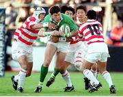 11 November 2000; Shane Horgan, Ireland, is tackled by Keiji Hirose, 10, Japan. International Rugby Friendly, Ireland v Japan, Lansdowne Road, Dublin. Picture credit: Brendan Moran / SPORTSFILE