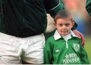 11 November 2000; Luke Clohessy, Ireland team mascot, stands with his father Peter Clohessy before the game. International Rugby Friendly, Ireland v Japan, Lansdowne Road, Dublin. Picture credit: Brendan Moran / SPORTSFILE