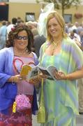 27 July 2005; Caitriona Morris, left, and Caroline Loughnane, both of Thurles, Co. Tipperary, enjoy a day at the races. Galway Races, Ballybrit, Co. Galway. Picture credit; Pat Murphy / SPORTSFILE