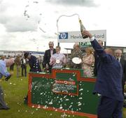 27 July 2005; Winning connections celebrate after Ansar  owner Kay Devlin was presented with the Hewlett-Packard Galway Plate. Galway Races, Ballybrit, Co. Galway. Picture credit; Pat Murphy / SPORTSFILE