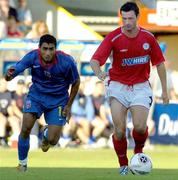 27 July 2005; Alan Moore, Shelbourne, in action against Nicolita Banel, Steuea Bucharest. UEFA Champions League, Second Qualifying Round, First Leg, Shelbourne FC v FC Steuea Bucharest, Tolka Park, Dublin. Picture credit; Brian Lawless / SPORTSFILE