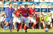 27 July 2005; Jim Crawford, Shelbourne, in action against Bostina Gabriel, Steuea Bucharest. UEFA Champions League, Second Qualifying Round, First Leg, Shelbourne FC v FC Steuea Bucharest, Tolka Park, Dublin. Picture credit; Brian Lawless / SPORTSFILE