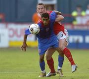 27 July 2005; Dave Crawley, Shelbourne, in action against Banel Nicolita, Steuea Bucharest. UEFA Champions League, Second Qualifying Round, First Leg, Shelbourne FC v FC Steuea Bucharest, Tolka Park, Dublin. Picture credit; Brian Lawless / SPORTSFILE