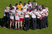 10 July 2005; The Tyrone team and management form a huddle after the match. Bank of Ireland Ulster Senior Football Championship Final, Armagh v Tyrone, Croke Park, Dublin. Picture credit; Brian Lawless / SPORTSFILE