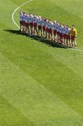 10 July 2005; The Tyrone team stand for a minutes silence in memory of the victims the London bombings. Bank of Ireland Ulster Senior Football Championship Final, Armagh v Tyrone, Croke Park, Dublin. Picture credit; Brian Lawless / SPORTSFILE