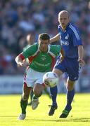 28 July 2005; John O'Flynn, Cork City, in action against Gediminas Paulauskas, FK Ekranas. UEFA Cup, First Qualifying Round, 2nd Leg, Cork City v FK Ekranas, Turners Cross, Cork. Picture credit; Brendan Moran / SPORTSFILE