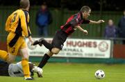28 July 2005; Andy Myler, Longford Town, is triped by Carmarthen Town goal keeper Tony Pennock to concede a penalty. UEFA Cup, First Qualifying Round, 2nd Leg, Carmarthen Town v Longford Town, Latham Park, Newtown, Wales. Picture credit; Matt Browne / SPORTSFILE