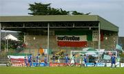28 July 2005; Cork City goalkeeper Mark McNulty fails to stop a header by Arunas Klimavicius, FK Ekranas (hidden behind Joe Gamble, no.20) for his sides goal in front of an empty &quot;Shed&quot;, the usual home of Cork City fans, but empty due to UEFA regulations on all seater stadia. UEFA Cup, First Qualifying Round, 2nd Leg, Cork City v FK Ekranas, Turners Cross, Cork. Picture credit; Brendan Moran / SPORTSFILE