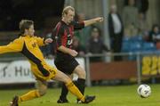 28 July 2005; Paul Keegan, Longford Town, in action against Richard Carter, Carmarthen Town. UEFA Cup, First Qualifying Round, 2nd Leg, Carmarthen Town v Longford Town, Latham Park, Newtown, Wales. Picture credit; Matt Browne / SPORTSFILE