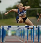 30 July 2005; Derval O'Rourke, Leevale A.C., on her way to winning the women's 100m hurdles race. Dublin International Games. Morton Stadium, Santry, Dublin. Picture credit; Pat Murphy / SPORTSFILE