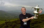 30 July 2005; Albert Shanahan representing Limerick lifts the cup after winning theM Donnelly Poc Fada na hEireann Final. Annaverna Mountain Ravensdale, Cooley Mountains, Co. Louth. Picture credit; Damien Eagers / SPORTSFILE