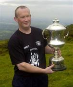 30 July 2005; Albert Shanahan representing Limerick lifts the cup after winning the M. Donnelly Poc Fada na hEireann Final. Annaverna Mountain Ravensdale, Cooley Mountains, Co. Louth. Picture credit; Damien Eagers / SPORTSFILE