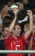30 July 2005; Cork captain Michael Prout lifts the cup after victory over Meath. All-Ireland Junior Football Final, Cork v Meath, O'Moore Park, Portlaoise, Co. Laois. Picture credit; Brendan Moran / SPORTSFILE
