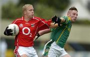 30 July 2005; Seamus Hayes, Cork is tackled by Ciaran McLoughlin, Meath. All-Ireland Junior Football Final, Cork v Meath, O'Moore Park, Portlaoise, Co. Laois. Picture credit; Brendan Moran / SPORTSFILE