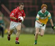 30 July 2005; Colm O'Driscoll, Cork in action against Diarmuid Horan, Offaly. All-Ireland Minor Football Championship Quarter Final, Cork v Offaly, O'Moore Park, Portlaoise, Co. Laois. Picture credit; Brendan Moran / SPORTSFILE