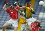 30 July 2005; Denis Crowley, Cork, knocks the ball into the Offaly net ahead of Richard Dalton and goalkeeper Dean Bracken. The goal was subsequently disallowed. All-Ireland Minor Football Championship Quarter Final, Cork v Offaly, O'Moore Park, Portlaoise, Co. Laois. Picture credit; Brendan Moran / SPORTSFILE
