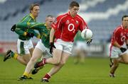 30 July 2005; Daniel Goulding, Cork in action against Paddy Nugent, Meath. All-Ireland Junior Football Final, Cork v Meath, O'Moore Park, Portlaoise, Co. Laois. Picture credit; Brendan Moran / SPORTSFILE
