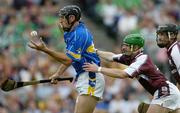 31 July 2005; Micheal Webster, Tipperary, is tackled by Ollie Canning, Galway, which led to a penalty for Tipperary. Guinness All Ireland Hurling Championship, Quarter Final, Galway v Tipperary, Croke Park, Dublin. Picture credit; Brendan Moran / SPORTSFILE