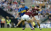 31 July 2005; John Devane, Tipperary, in action against David Collins (7) and Fergal Healy, Galway. Guinness All-Ireland Hurling Championship, Quarter-Final, Galway v Tipperary, Croke Park, Dublin. Picture credit; Brendan Moran / SPORTSFILE