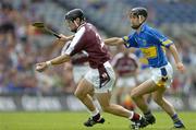 31 July 2005; Damien Joyce, Galway, in action against Tommy Dunne, Tipperary. Guinness All-Ireland Hurling Championship, Quarter-Final, Galway v Tipperary, Croke Park, Dublin. Picture credit; Brendan Moran / SPORTSFILE