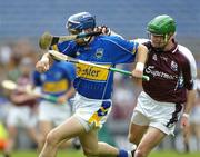 31 July 2005; Benny Dunne, Tipperary, is tackled by Ollie Canning, Galway. Guinness All-Ireland Senior Hurling Championship Quarter-Final, Galway v Tipperary, Croke Park, Dublin. Picture credit; Ray McManus / SPORTSFILE
