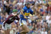 31 July 2005; Michael Webster, Tipperary, is tackled by Ollie Canning, Galway. The referee awarded a penalty as a result of the tackle. Guinness All-Ireland Senior Hurling Championship Quarter-Final, Galway v Tipperary, Croke Park, Dublin. Picture credit; Ray McManus / SPORTSFILE