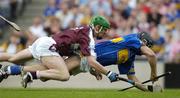 31 July 2005; Michael Webster, Tipperary, is tackled by Ollie Canning, Galway. The referee awarded a penalty as a result of the tackle. Guinness All-Ireland Senior Hurling Championship Quarter-Final, Galway v Tipperary, Croke Park, Dublin. Picture credit; Ray McManus / SPORTSFILE