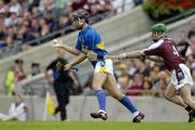 31 July 2005; Colin Morrissey, Tipperary, is tackled by Ollie Canning, Galway. Guinness All-Ireland Senior Hurling Championship Quarter-Final, Galway v Tipperary, Croke Park, Dublin. Picture credit; Ray McManus / SPORTSFILE