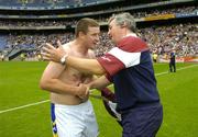 31 July 2005; Galway manager Conor Hayes with Tipperary's John Carroll after the game. Guinness All-Ireland Hurling Championship, Quarter-Final, Galway v Tipperary, Croke Park, Dublin. Picture credit; Brendan Moran / SPORTSFILE