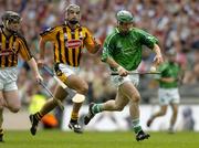 31 July 2005; Stephen O'Shaughnessy, Limerick, races away from Bryan Barry and Peter Barry, left, Kilkenny. Guinness All-Ireland Hurling Championship, Quarter-Final, Kilkenny v Limerick, Croke Park, Dublin. Picture credit; Damien Eagers / SPORTSFILE