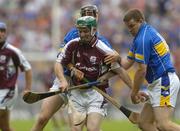 31 July 2005; Colin Coen, Galway, is tackled by John Carroll, right, and Tommy Dunne,Tipperary. Guinness All-Ireland Hurling Championship, Quarter-Final. Galway v Tipperary, Croke Park, Dublin. Picture credit; Damien Eagers / SPORTSFILE