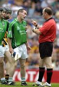 31 July 2005; Referee Ger Harrington explains to Limerick's Donie Ryan as to why he disallowed the 'goal' in the first minute of the second half. Guinness All-Ireland Senior Hurling Championship Quarter-Final, Kilkenny v Limerick, Croke Park, Dublin. Picture credit; Ray McManus / SPORTSFILE