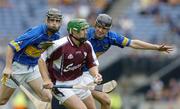 31 July 2005; Fergal Healy, Galway, is tackled by Eddie Enright, Tipperary. Guinness All-Ireland Senior Hurling Championship Quarter-Final, Galway v Tipperary, Croke Park, Dublin. Picture credit; Ray McManus / SPORTSFILE