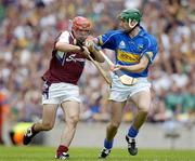 31 July 2005; Alan Kerins, Galway, is tackled by Declan Fanning, Tipperary. Guinness All-Ireland Senior Hurling Championship Quarter-Final, Galway v Tipperary, Croke Park, Dublin. Picture credit; Ray McManus / SPORTSFILE