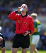 1 August 2005; Referee Francis Flynn, Leitrim, takes a drink during a break in play. All-Ireland Minor Football Championship Quarter-Final, Laois v Kerry, Gaelic Grounds, Limerick. Picture credit; Kieran Clancy / SPORTSFILE