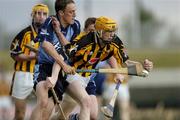 20 July 2005; Austin Murphy, Kilkenny, in action against Dublin's Willie Lowry. Leinster U21 Hurling Championship Final, Kilkenny v Dublin, Dr. Cullen Park, Carlow. Picture credit; Pat Murphy / SPORTSFILE
