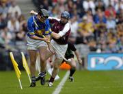 31 July 2005; Eddie Enright, Tipperary, is tackled by Damien Hayes, Galway. Guinness All-Ireland Senior Hurling Championship Quarter-Final, Galway v Tipperary, Croke Park, Dublin. Picture credit; Ray McManus / SPORTSFILE
