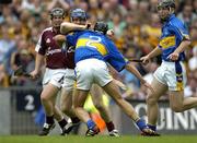 31 July 2005; Damien Hayes, Galway, holds off the challenge of Hugh Moloney, Tipperary, on his way to scoring his sides second goal. Guinness All Ireland Hurling Championship, Quarter Final, Galway v Tipperary, Croke Park, Dublin. Picture credit; Brendan Moran / SPORTSFILE