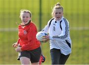 26 February 2014; Kaitlin Dutton, from St. Dominic's, in action against Abhia Finegan, from Caritas College, during the Dublin Girls Give It a Try Blitz. Templeogue United / St. Judes GAA Grounds, Dublin. Picture credit: Matt Browne / SPORTSFILE